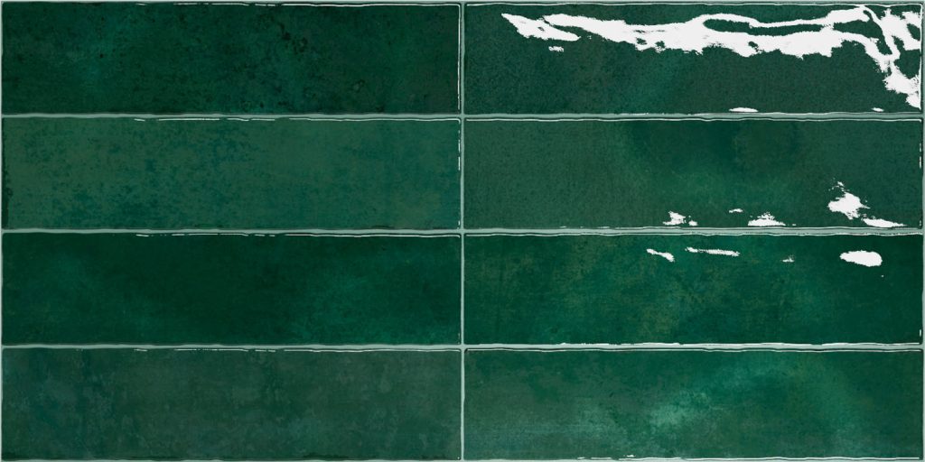Nairobi Green artisan style glossy ceramic subway tile with non-flat edge and surface. Made in Spain, in a 3x12" size.
