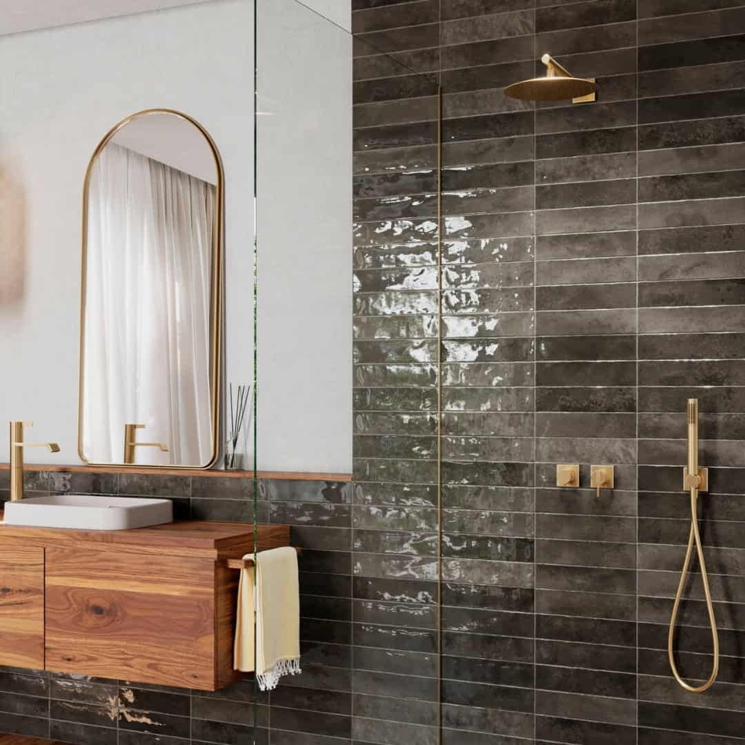 Nairobi Slate artisan style glossy ceramic subway tile with non-flat edge and surface. Made in Spain, in a 3x12" size.