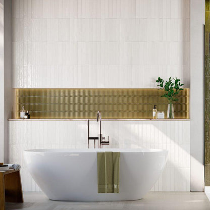 Nairobi White artisan style glossy ceramic subway tile with non-flat edge and surface. Installed on a shower wall.