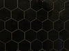 Nero Assoluto polished porcelain mosaic with a pure black colour, for floors and walls. In a small hexagon shape.