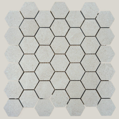 Nordic Chalk matte porcelain mosaic with a white/off-white stone look, for floors and walls. In a small hexagon size.