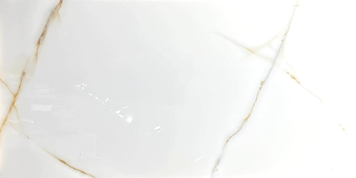 Ocean White Onyx polished porcelain tile with a white and gold marble design, for floors and walls. In a 24x48" size.