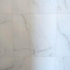 Onice Grigio polished porcelain tile with a grey onyx design, for floors and walls. In a 24x24" size.