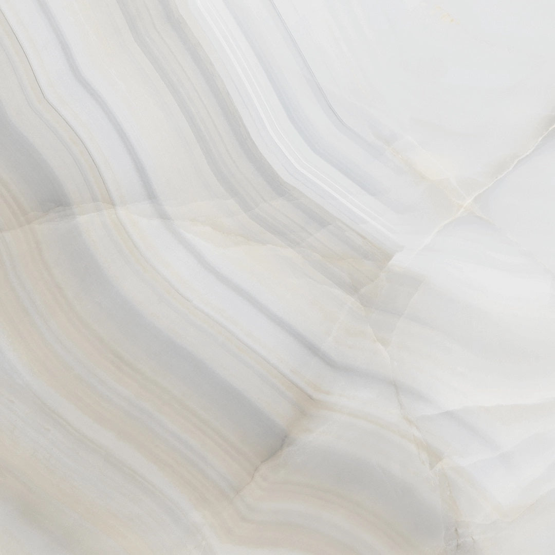 Onice Perla glossy porcelain tile with a grey onyx design, for floors and walls. Made in Spain, in a 24x24" size.