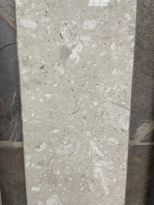 Perlato Superior beige quartz shower arch in a 6x76" size.