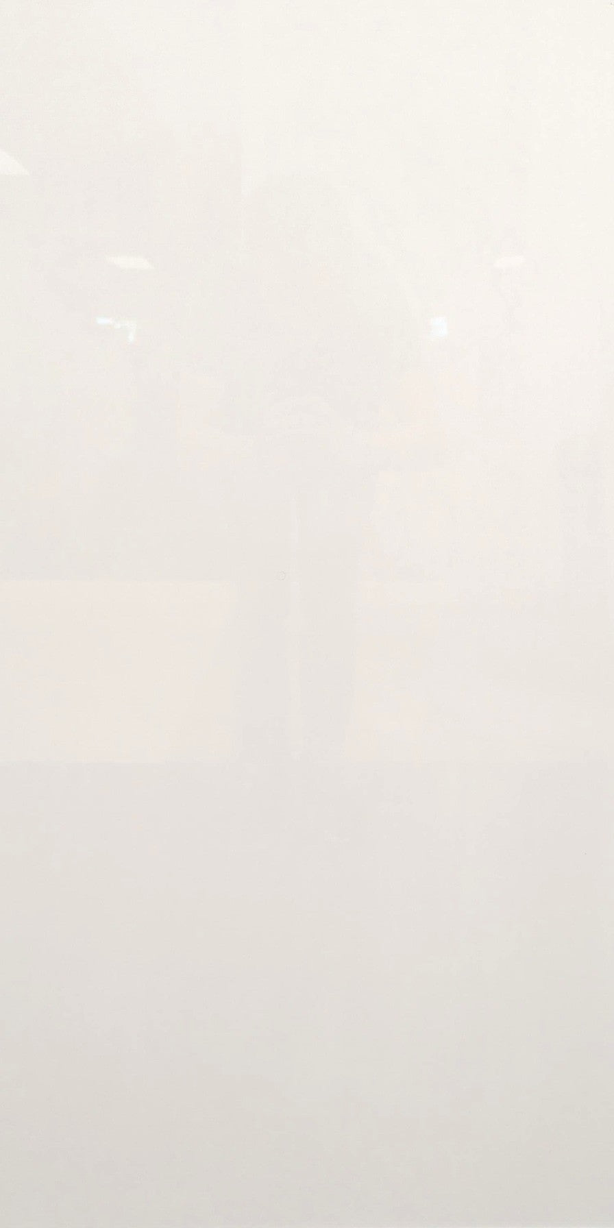Pure White polished porcelain tile for floors and walls. In a 24x48" size.