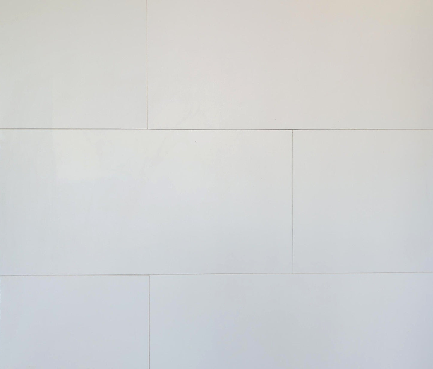 Pure White matte porcelain tile for floors and walls. In a 12x24" size.