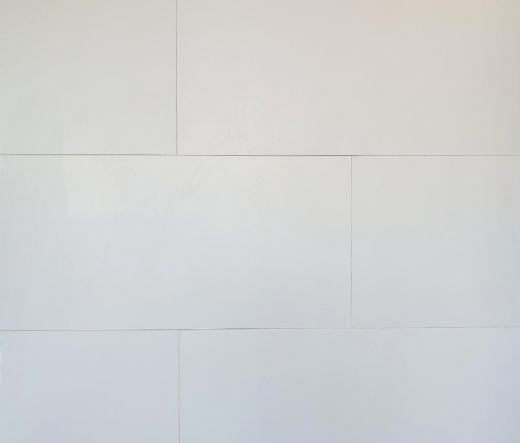 Pure White matte porcelain tile for floors and walls. In a 12x24" size.