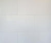 Pure White matte porcelain tile for floors and walls. In a 12x24" size.