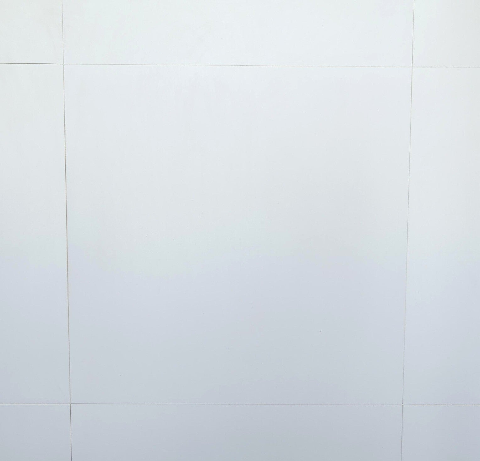 Pure White matte porcelain tile for floors and walls. In a 24x24" size.