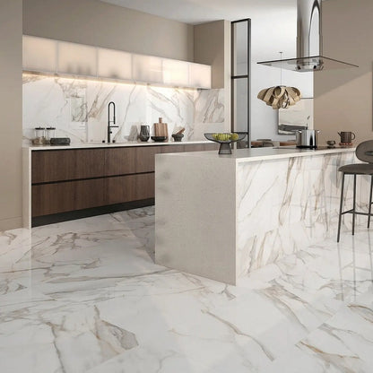 Radiant Calacatta porcelain tile with a white and grey marble design, for floors and walls. Installed in a room.
