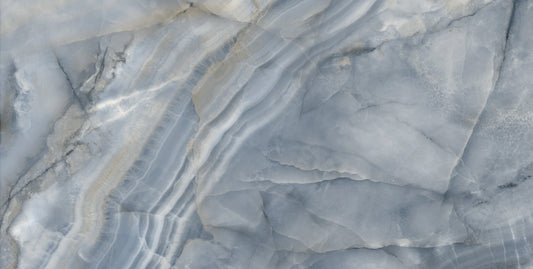 Rodas Smerato polished porcelain tile with a blue onyx design, for floors and walls. Made in Spain, in a 24x48" size.