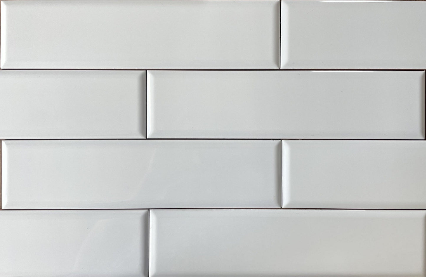 Romo Blanco white glossy ceramic subway tile with a rounded beveled edge, for walls. Made in Spain, in a 3x12" size.