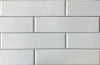 Romo Blanco white glossy ceramic subway tile with a rounded beveled edge, for walls. Made in Spain, in a 3x12" size.