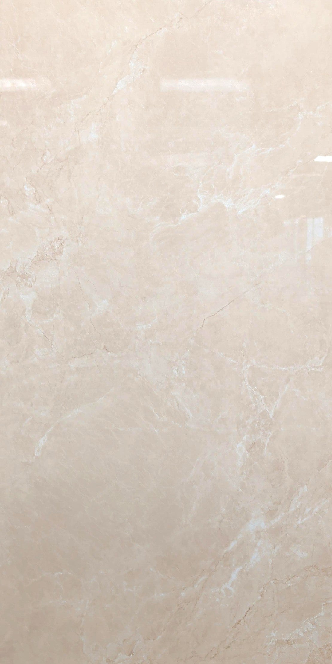 Royal Botticino polished porcelain tile with a natural beige marble style, for floors and walls. In a 24x48" size.