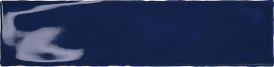 Rural Oxford artisan style glossy ceramic subway tile with navy blue surface. Made in Spain, in a 3x12" size.