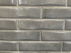Sokar Mare glossy ceramic subway tile with a blue/grey solid colour, for walls. Made in Spain, in a 3x12" size.