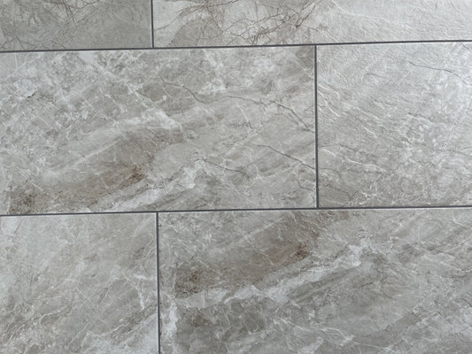 Sonoma Sky matte porcelain tile with a grey stone design, for floors and walls. Made in Italy, in a 12x24" size.
