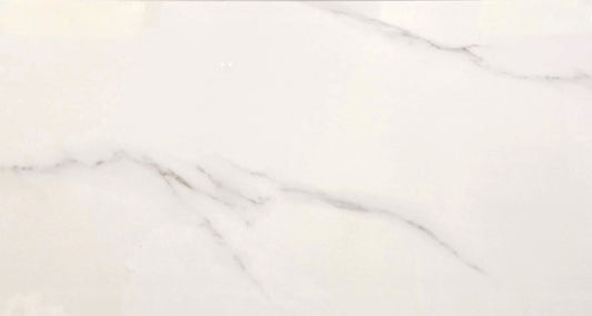 Statuario Argentum polished porcelain tile with a white marble effect, for floors and walls. In a 30x60" size.