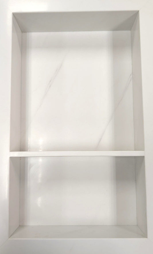 Statuario prebuilt quartz shower niche made of engineered stone that offers shower storage, with a shelf.