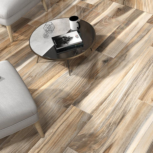Tasmania Drift polished porcelain tile with a wood design, for floors and walls. Made in Spain, installed in a room.