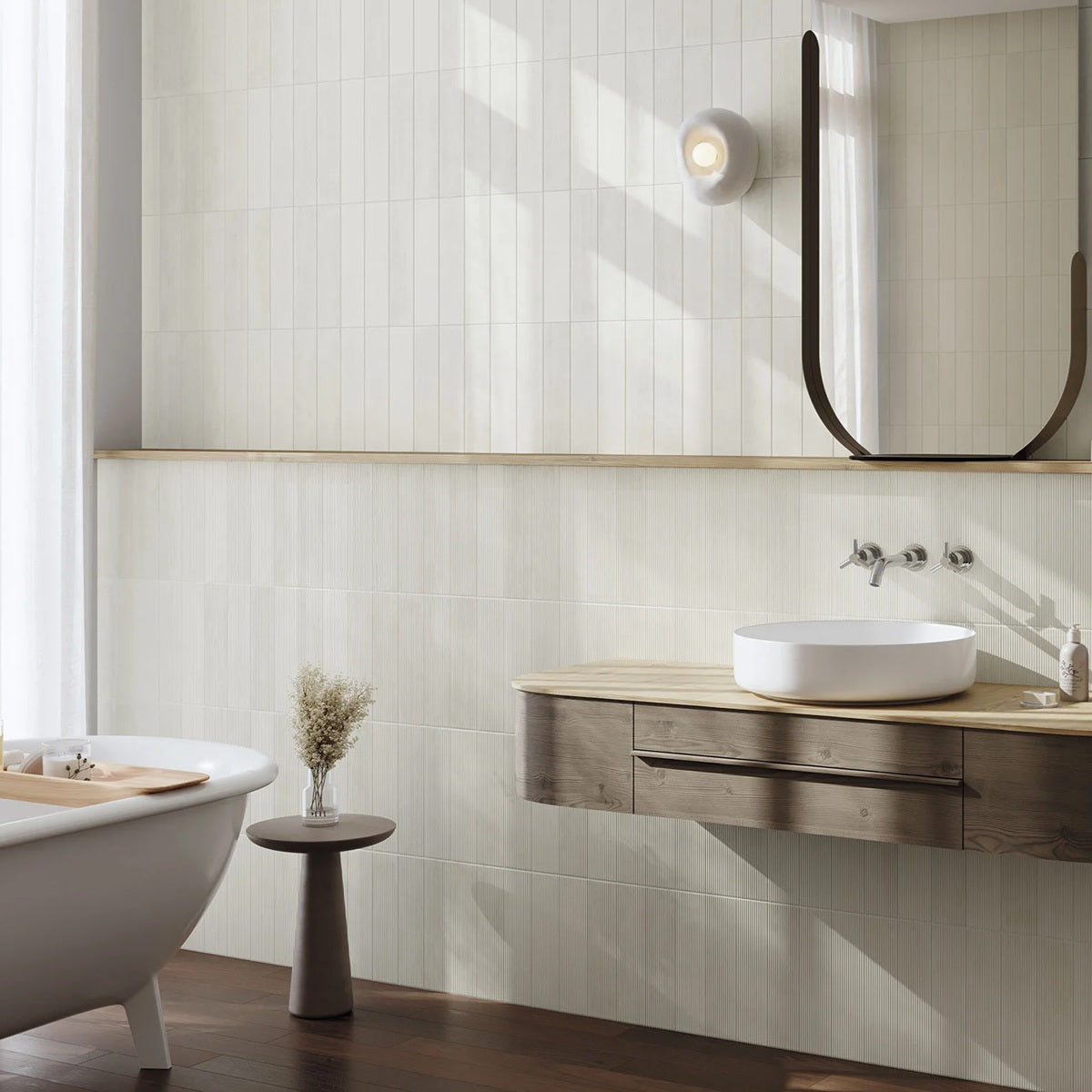 Terre White terracotta style matte ceramic subway tile. Made in Spain, installed in a bathroom.