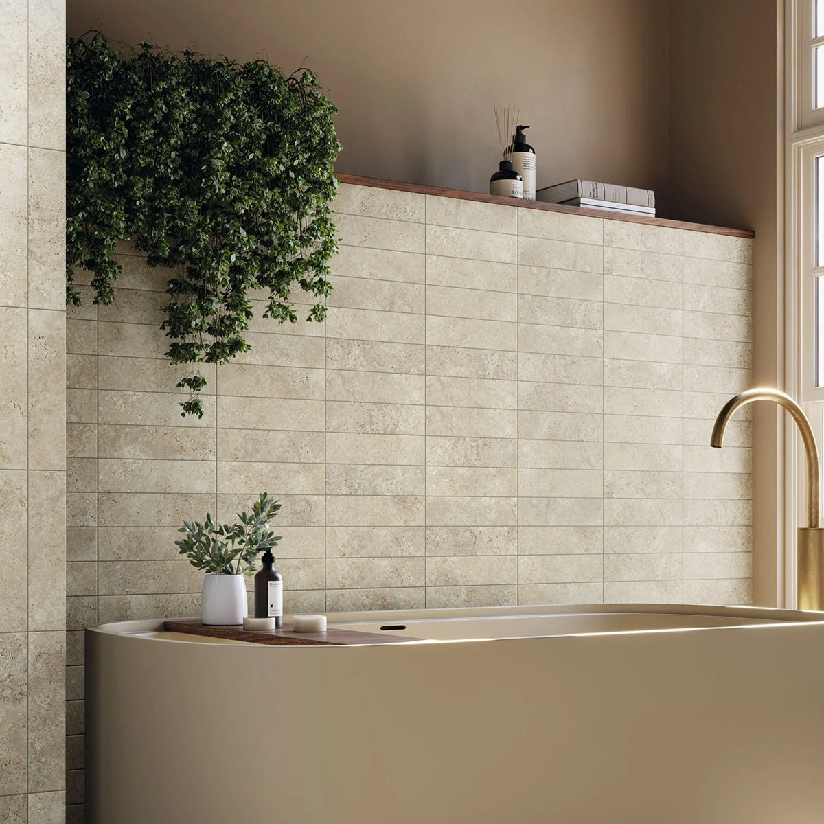 Travertino travertine style beige matte ceramic subway tile. Made in Spain, installed in a bathroom.