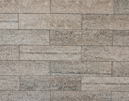 Travertino travertine style beige matte ceramic subway tile. Made in Spain, in a 3x12" size.