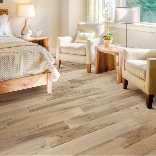 Vintage Miele matte porcelain tile with a beige wood design, for floors and walls. Made in Italy, installed in a room.