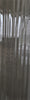 Wilderness Walk black/dark grey glass subway tile with a waved finish. In a 4x12" size.