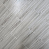 Winter Cabin matte ceramic tile with a light grey wood design, for floors and walls. In a 6x24" size.