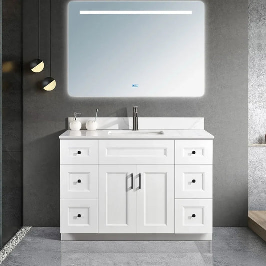 48 inch wood bathroom vanity in a white colour with a carrara quartz top and black hardware. With doors and drawers.