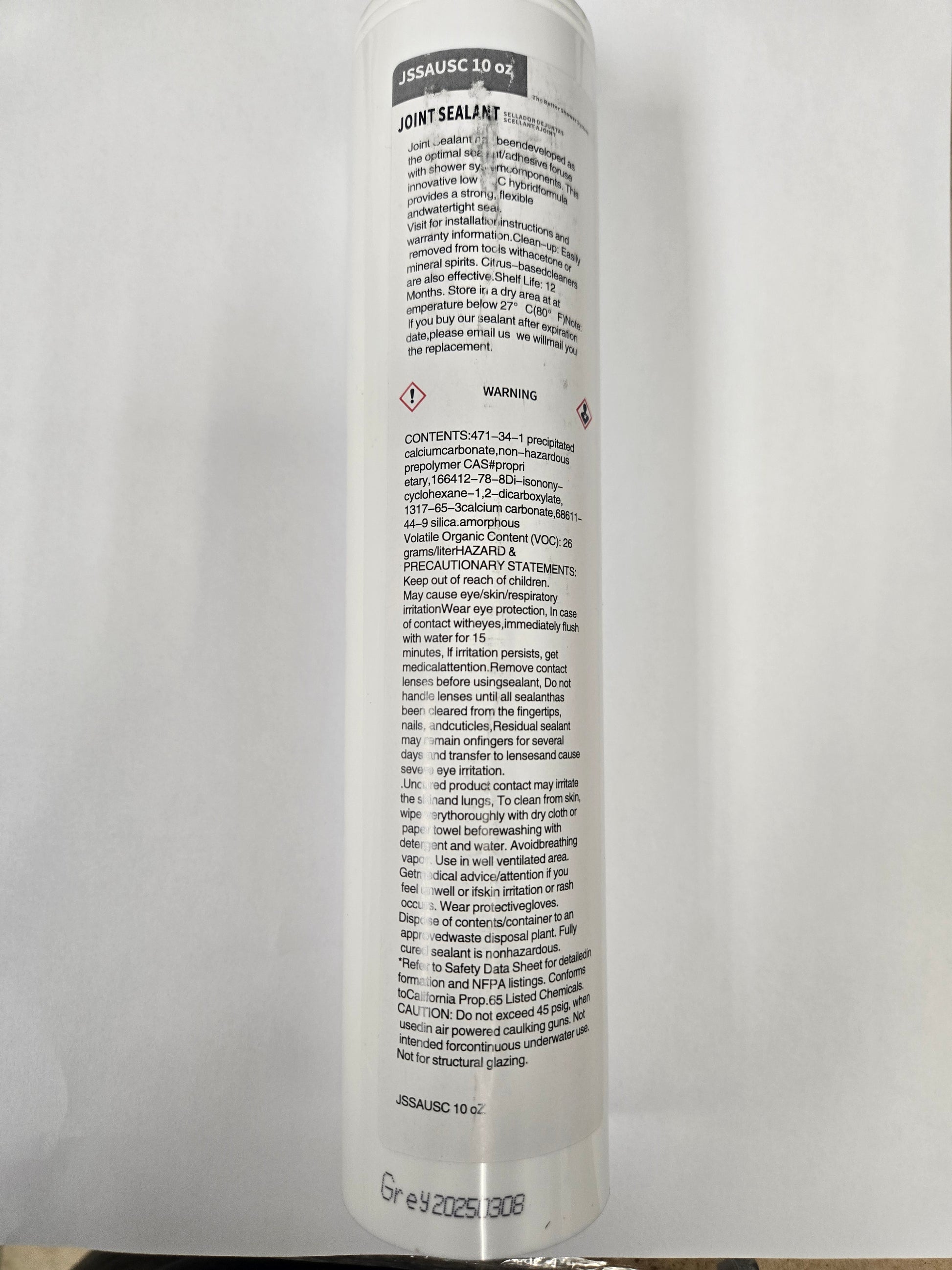 Tube of joint sealant for extruded polystyrene (XPS) foam tile backer boards.